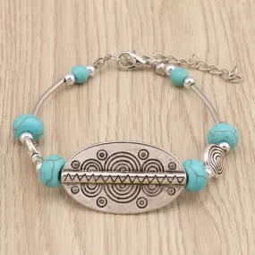 Carved Oblong and Turquoise Bead